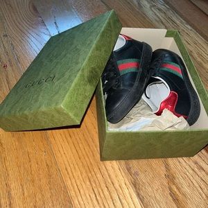 Black Gucci sneakers